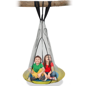 2 kids sitting on a saucer round swing hanging from a tree branch